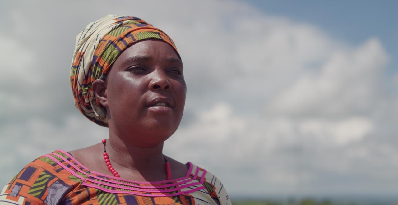 A woman in brightly coloured dress and matching