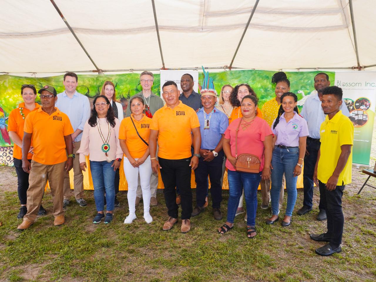 Group photo of EU and UN Representatives and Blossom Inc with members of the Batavia Village Council