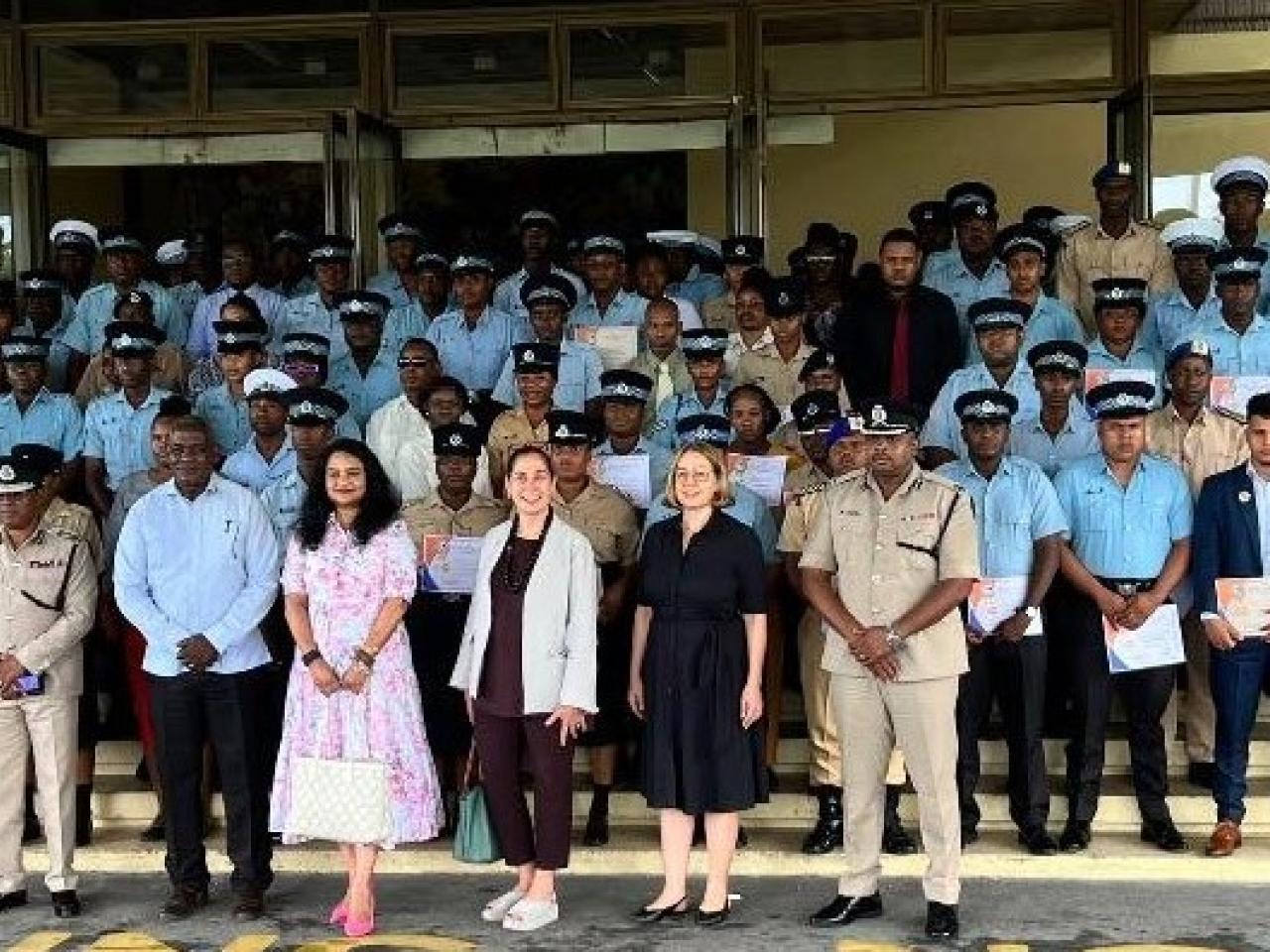 Minister of Human Services and Social Security, Dr. Vindhya Persaud; Minister of Home Affairs, Robeson Benn; Commissioner of Police (ag), Clifton Hicken; UN Resident Coordinator in Guyana Yeşim Oruç; graduates and other officials (DPI photo)