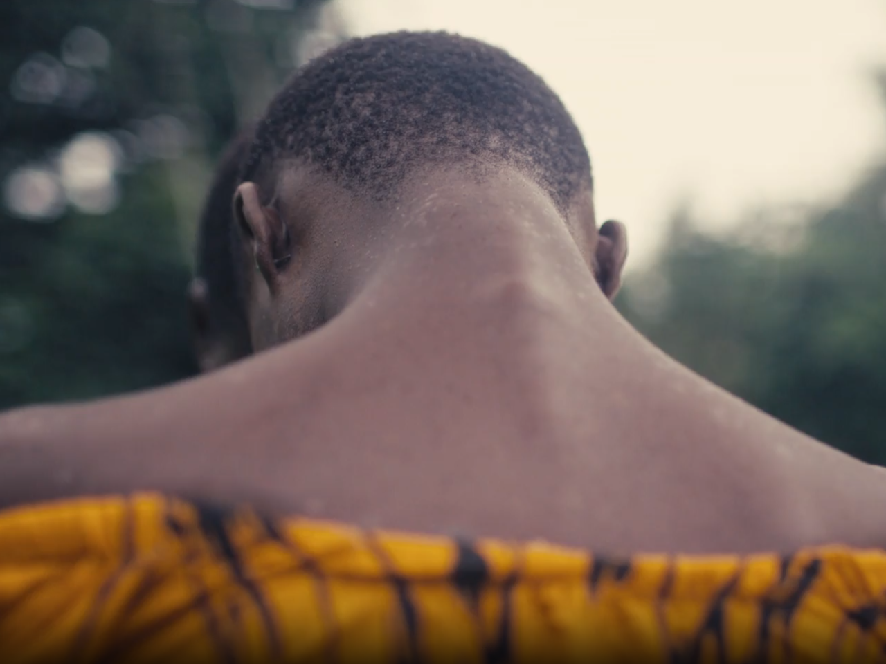 Woman with short hair pictured from behind
