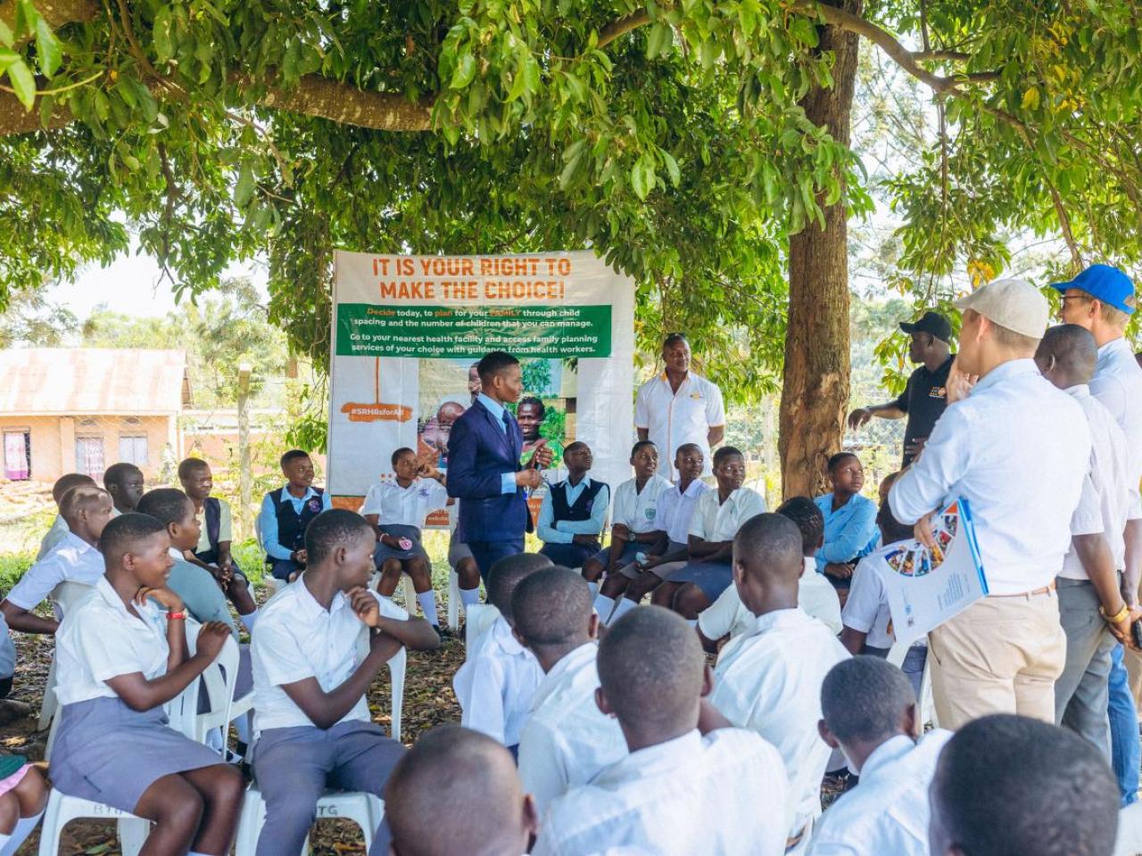 A student from Bujubuli Secondary School sharing about the GBV club with partners during the Team Europe Tour to Kyaka II Refugee Settlement Photo: © UN Uganda