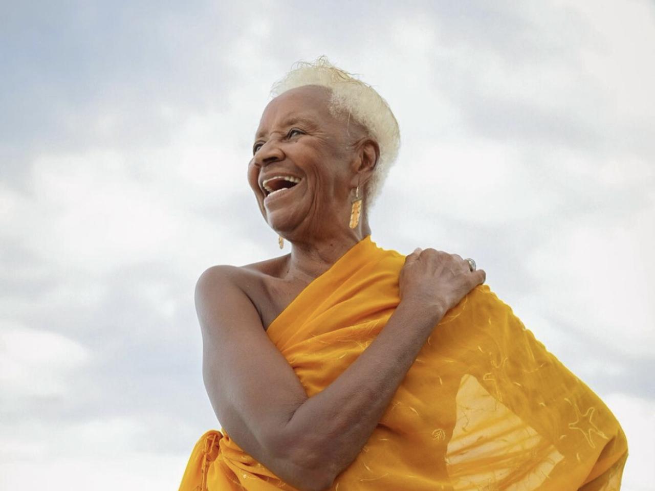 WOMAN IN YELLOW DRESS