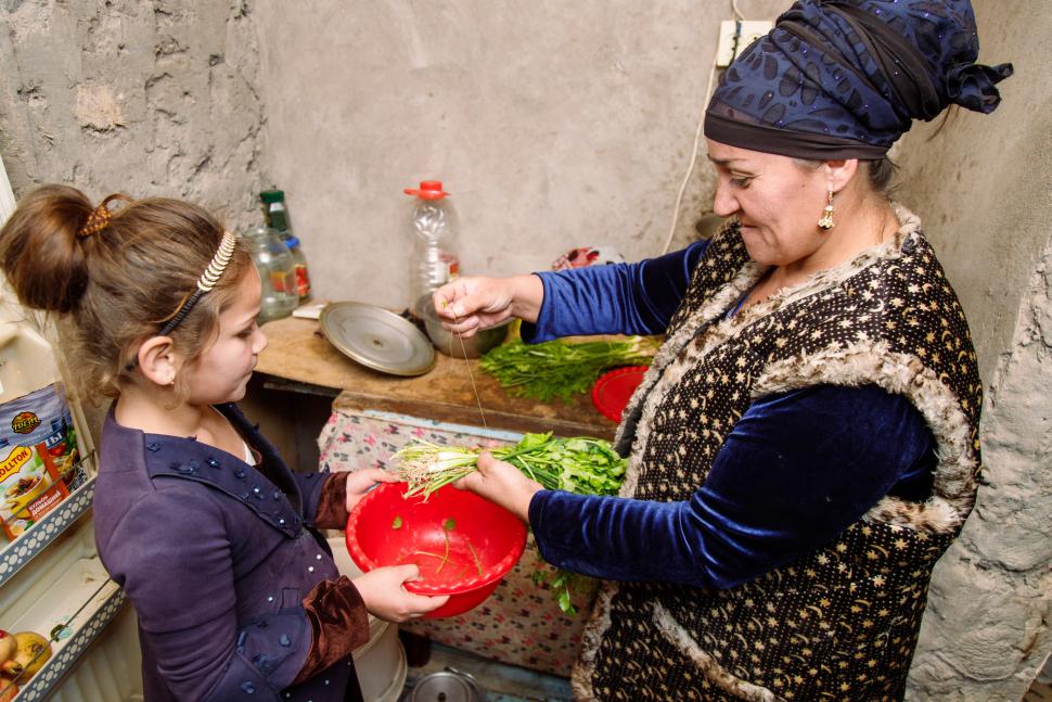 Young girl and woman in kitchen