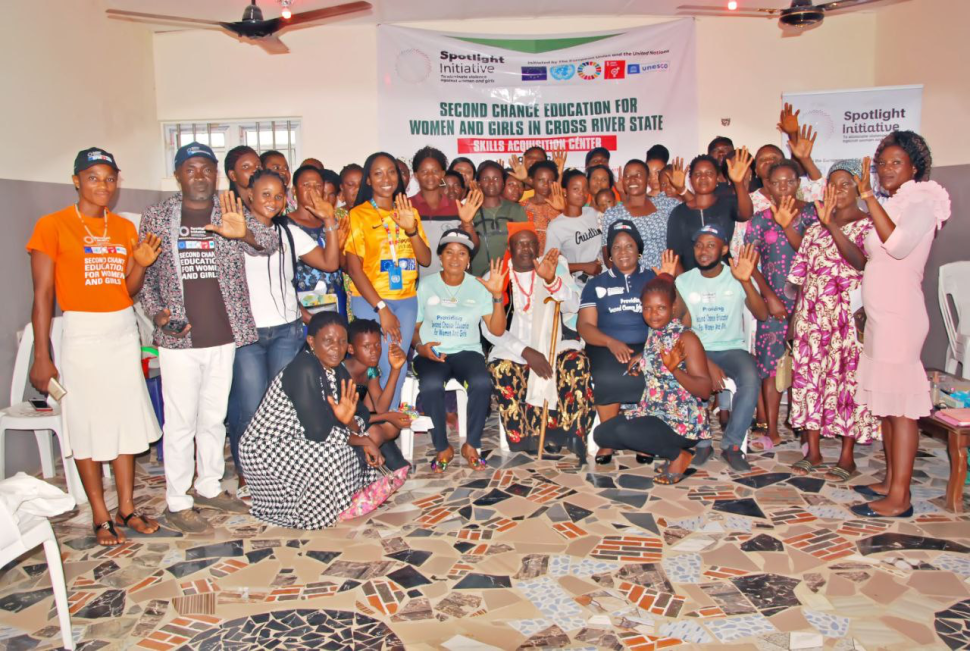 Group photo of community waving