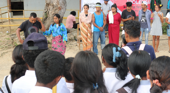 Students watch a live play performance