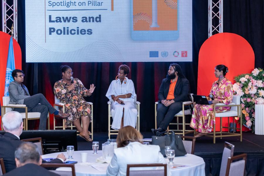 People on stage during panel discussion