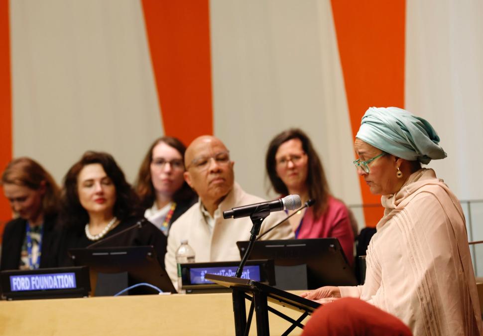 Panellists watch Amidna Mohemmed speak at lectern