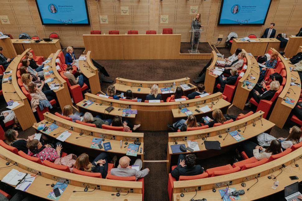 People seated in semi circle