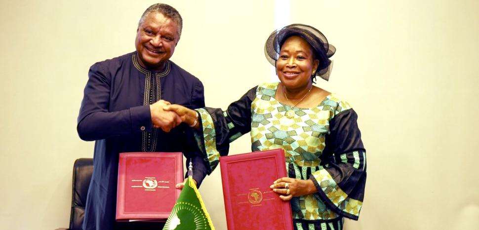 A man and woman shaking hands