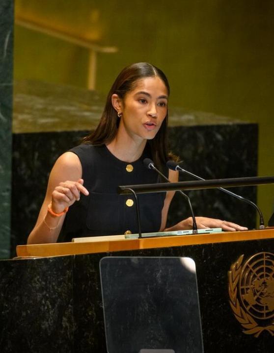 Ms Bovell speaking at podium