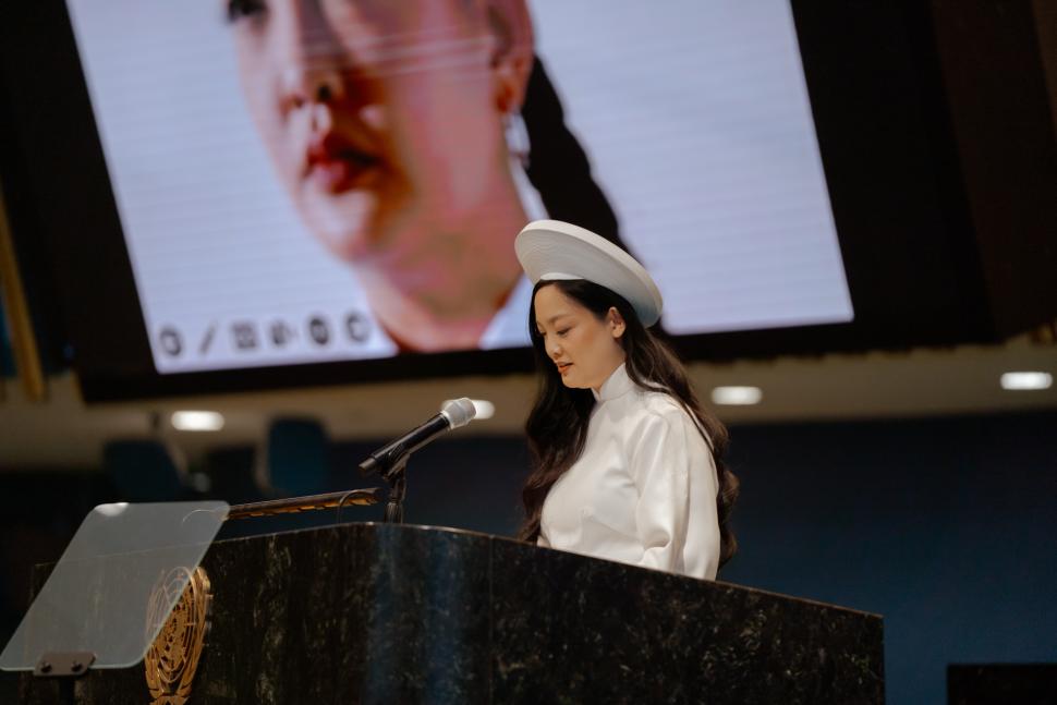 Amanda Nguyen at podium.