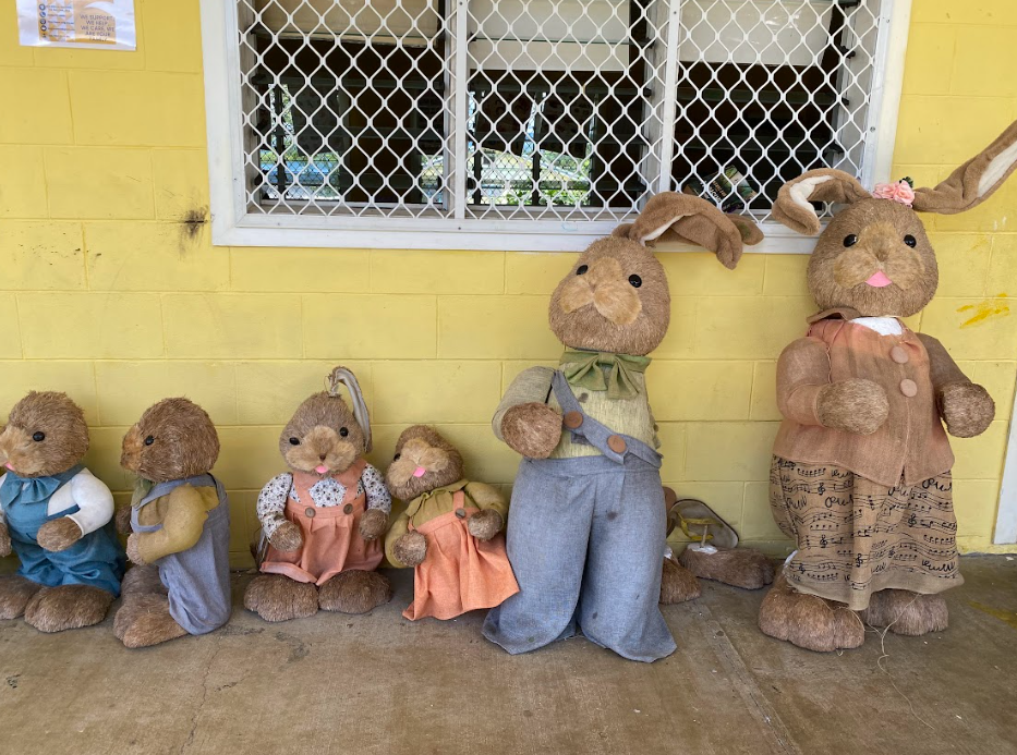 Soft toys sitting outside a classroom