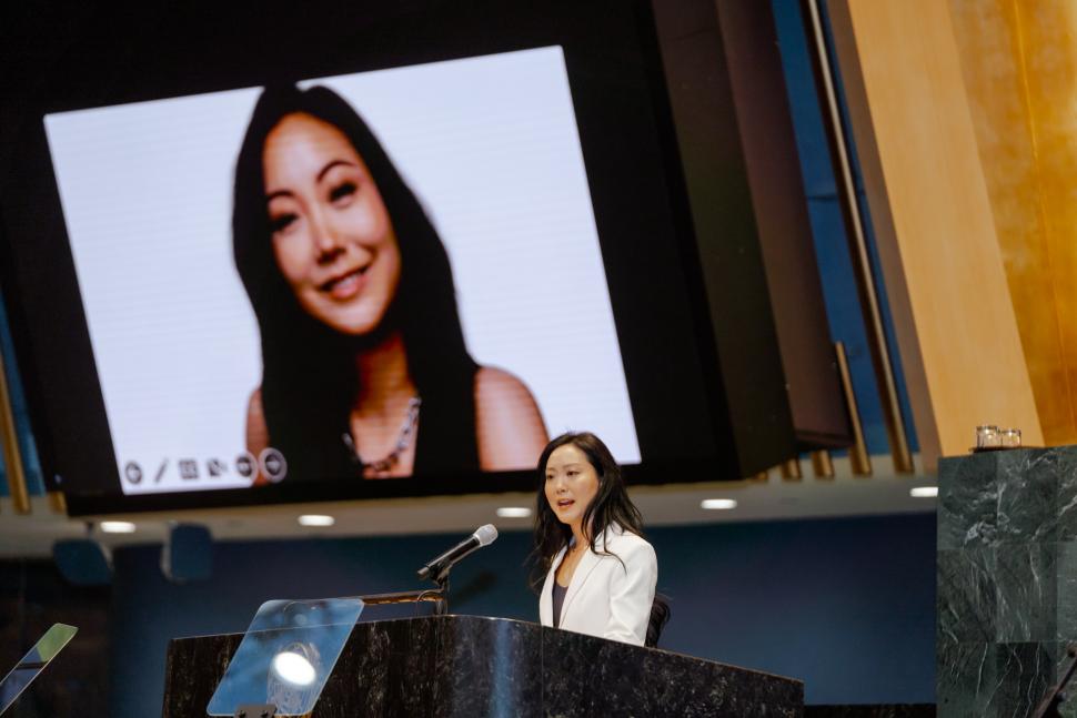 Sandra Kwon speaking at lectern