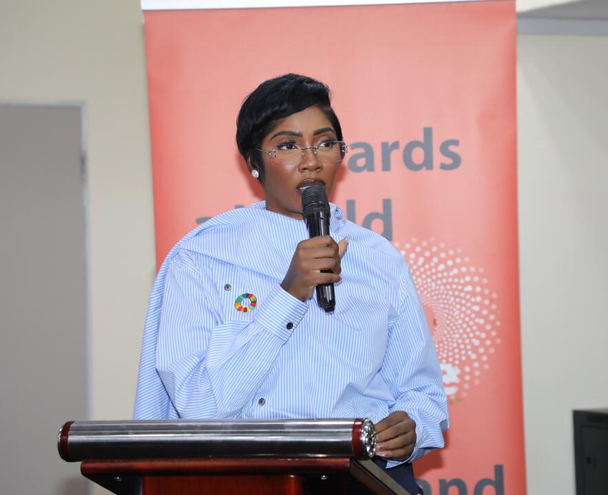 Tiwa Savage addressing participants at the intergenerational dialogue