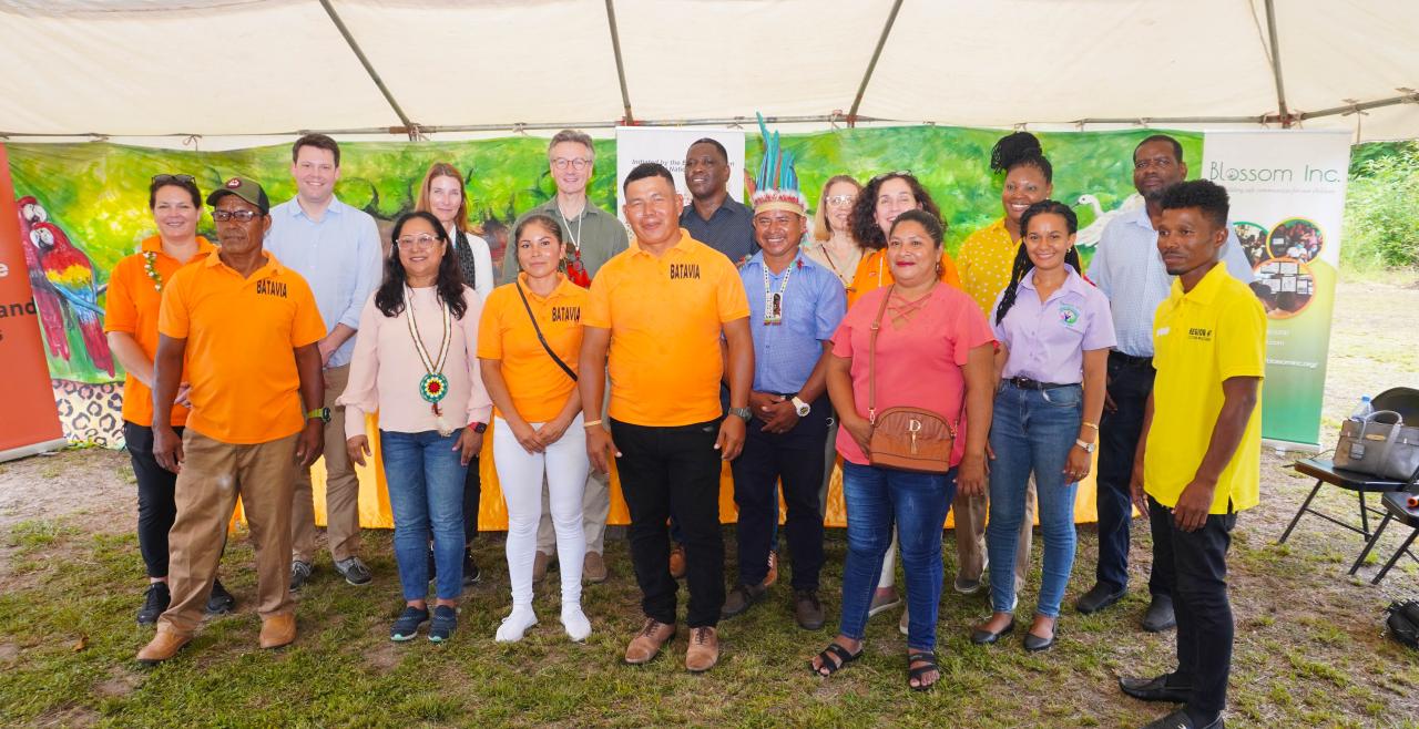 Group photo of EU and UN Representatives and Blossom Inc with members of the Batavia Village Council