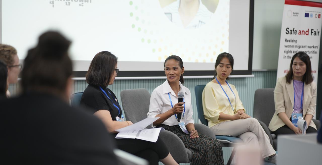 a group of women sitting on a panel