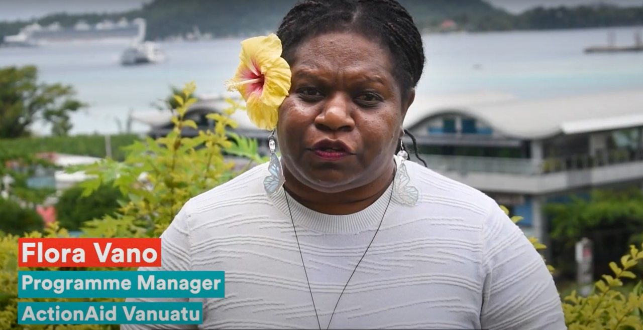 A Vanuatu women speaking on the hill overlooking Vila Bay.