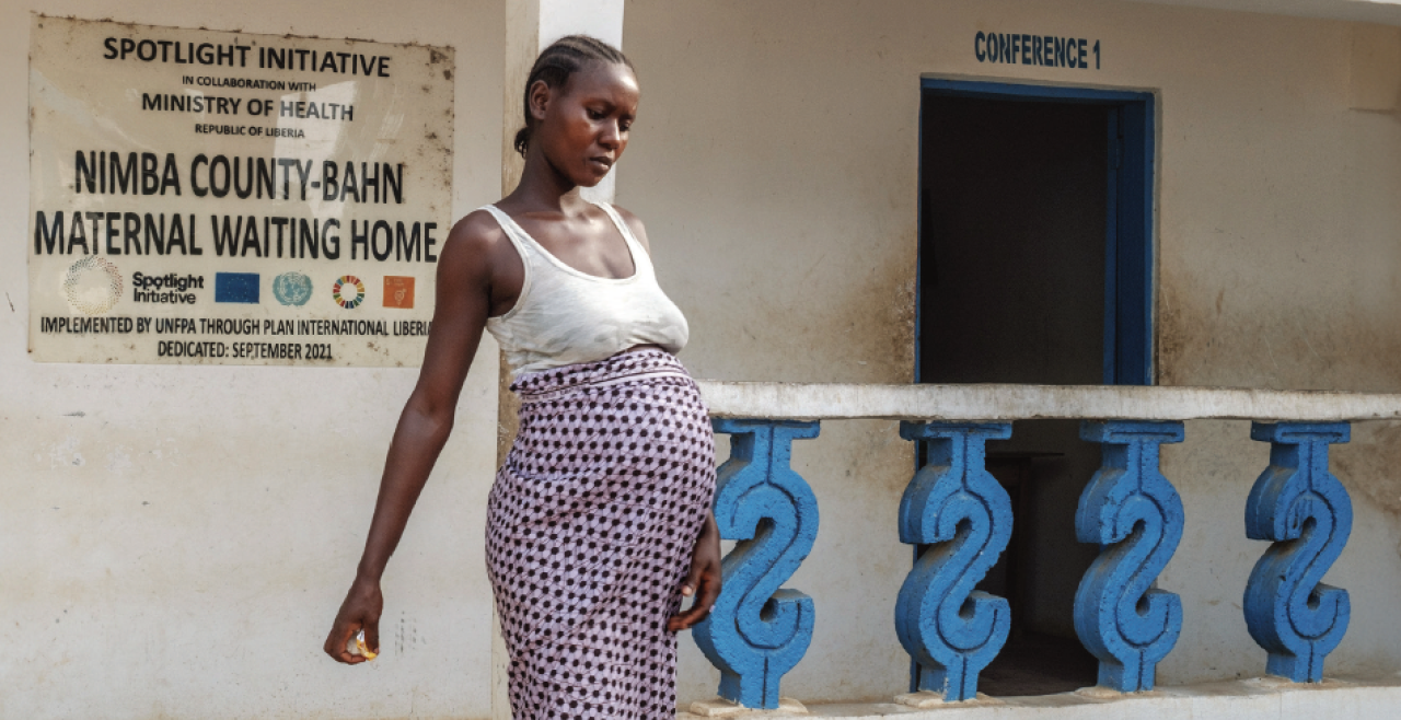 A pregnant woman leaving the maternal health centre