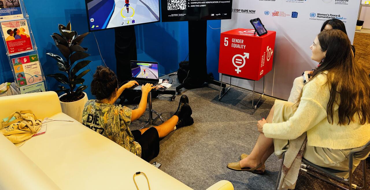 A gamer plays Sync or Storm at an SVRI stall